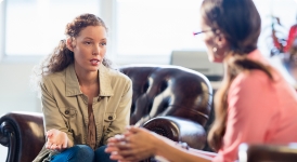 Two women talking with eachother