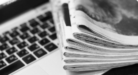 Newspaper on a laptop
